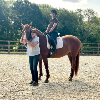 Lucy and MAH Horse and rider in an arena with trainer, Maryanne Horn