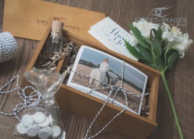 Box and images flat lay
